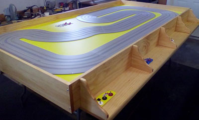Custom wired slot car table with HO track